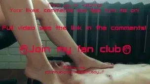 Foot worship, slave lying on the floor licking feet and sucking toes of mistress, female domination